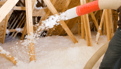 Spray foam insulation being applied to an attic for improved energy efficiency in Austin, TX.