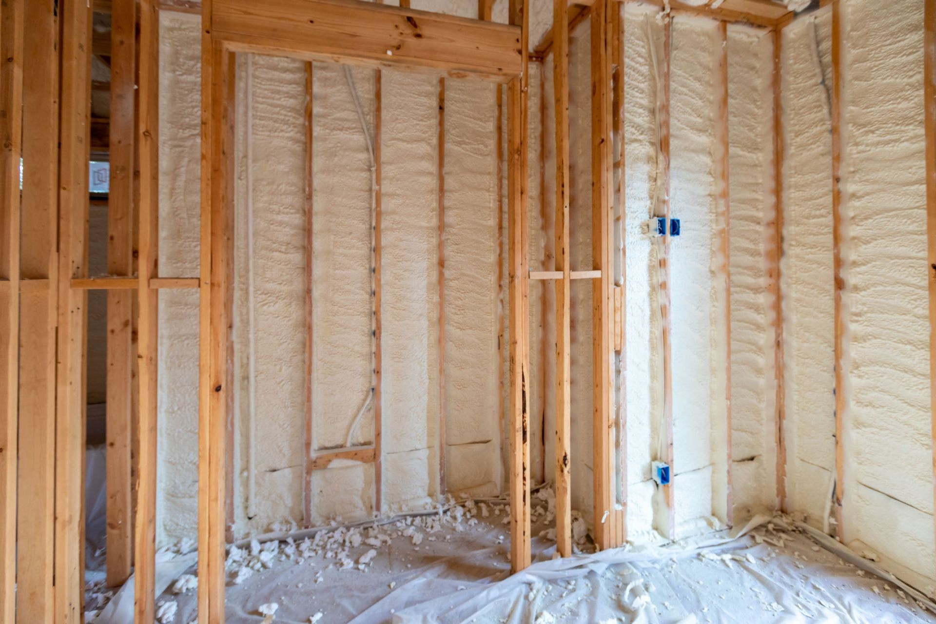 Insulated commercial walls with spray foam application for durability and efficiency.